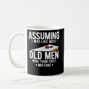 Mens AssumingI Was Like Most Old Men Cornhole Coffee Mug