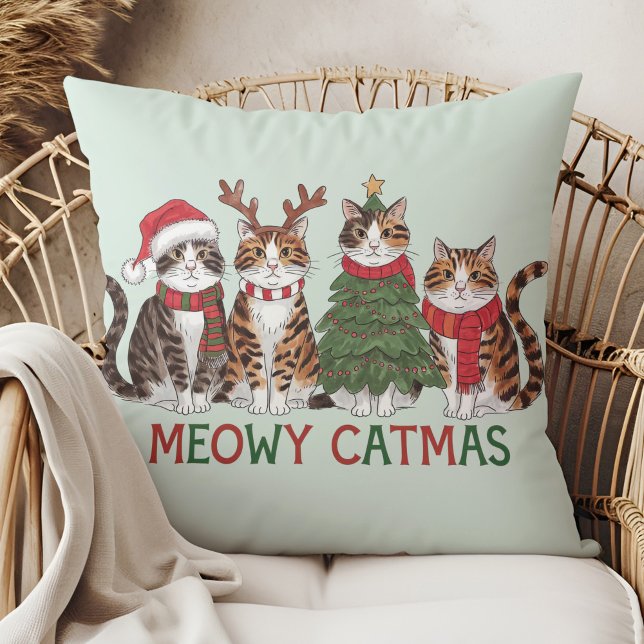 Meowy Catmas Funny Holiday Cats - Christmas Decor  Cushion (Meowy Catmas Funny Holiday Cats - Christmas Decor Throw Pillow in a boho rattan armchair.)