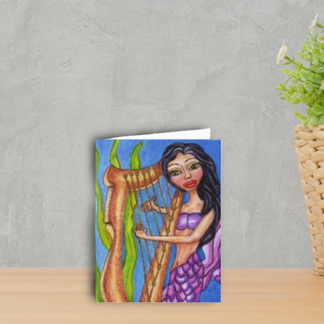 Mermaid With Harp Notecard (Mermaid purple tail playing harp in seaweed on ocean blue notecards.)