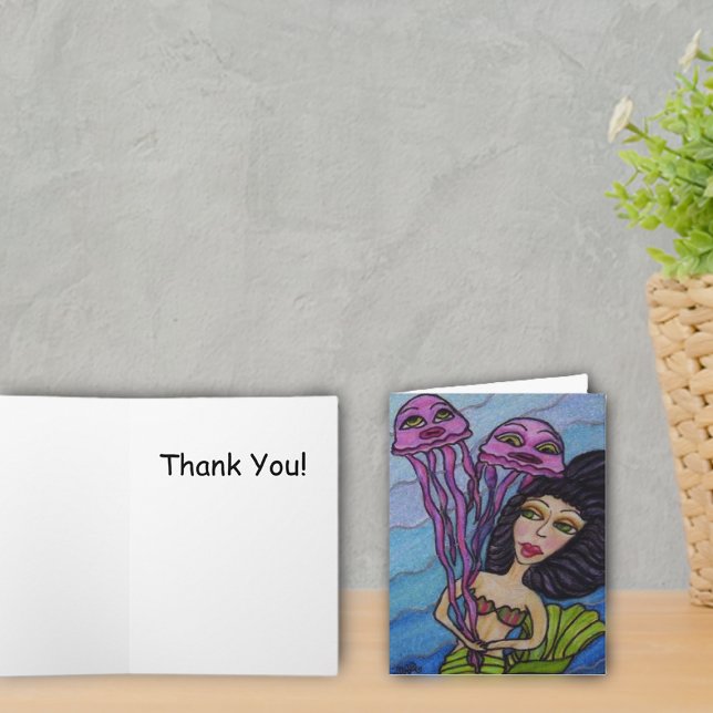 Mermaid With Jellyfish Thank You Card (Dark haired mermaid with purple jellyfish on blue thank you cards.)
