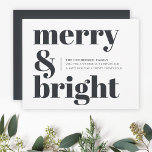 Merry and Bright Black and White Trendy Christmas Holiday Card<br><div class="desc">A stylish modern flat holiday greeting card with a bold retro typography quote "merry & bright" in off black on a white background with a complementary feature color on the reverse. The greeting, message and name can be easily customized to suit your own needs. A trendy fun design to stand...</div>