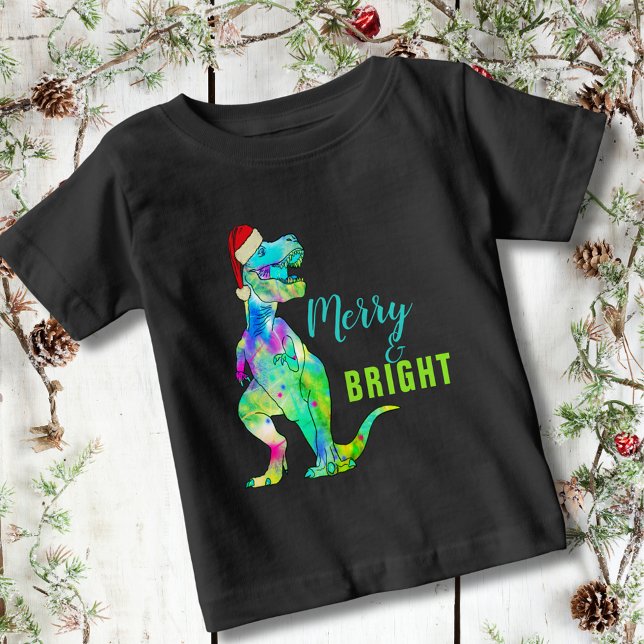 Merry and Bright Christmas Dinosaur Baby T-Shirt (Merry and bright funny Christmas dinosaur colorful T-Rex wearing a santa hat kids T-Shirt)