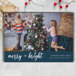 Merry and Bright Elegant Christmas Kids Photo Holiday Card<br><div class="desc">Celebrate the season with the Merry and Bright Elegant Christmas Kids Photo Holiday Card, featuring a soft blue colour palette. This elegant and simple design places your child's photo at the centre, framed by clean typography and a soft, wintry feel. Perfect for families who love a modern yet heartwarming touch,...</div>