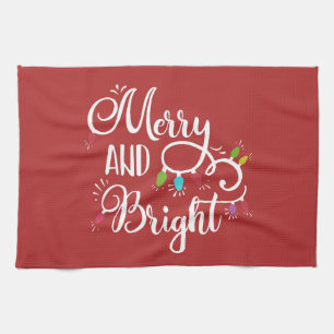 merry and bright holiday lights tea towel