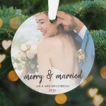 Merry and Married | Newleyweds First Christmas Ornament<br><div class="desc">Simple, stylish wedding photo christmas ornament in a modern minimalist design style with an elegant natural script typography in classic black and white, with an informal handwriting style font. The photo and text can easily be personalised with your name and message for a unique one of a kind wedding design...</div>