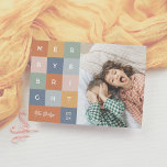 Merry & Bright Colourful Modern Christmas Photo Holiday Card<br><div class="desc">Celebrate the season in style with our “Merry & Bright” photo card, a bold and vibrant design perfect for those who love a fun, modern twist on tradition. Featuring colourful squares in orange, yellow, green, pink, and blue, each letter of “merry & bright” pops inside its own vibrant block. Below,...</div>