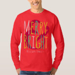 Merry & Bright Red, Green Blue Typography Holiday T-Shirt<br><div class="desc">This holiday shirt features a modern typography design that reads "Merry & Bright" in red,  green orange,  turquoise with a name for you to personalise. Designed by world renowned artist Tim Coffey.</div>