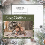 Merry Christmas 2024 Photo Typography Green Gold Holiday Postcard<br><div class="desc">Green and gold snowflakes Christmas photo greeting postcard with text,  "Merry Christmas 2024."  Personalise with the year,  your photos,  name,  address,  and even your own message. Contact me for assistance with your customisations or to request additional matching or coordinating Zazzle products for your holiday season.</div>