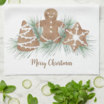 Merry Christmas Cookies Tea Towel<br><div class="desc">This festive kitchen towel is decorated with watercolor Christmas cookies and foliage and says Merry Christmas.
Easily customisable.
Because we create our artwork you won't find this exact image from other designers.
Original Watercolor © Michele Davies.</div>