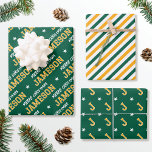Merry Christmas Custom Name Monogram Green Gold Wrapping Paper Sheet<br><div class="desc">Elevate your gift giving this holiday season with a set of beautifully coordinated designs! Featuring three unique patterns in matching colours, that can be used individually or as a set. The first sheet is personalised with the recipient's name in classic block-style lettering. The 'Merry Christmas' phrase can also be customised...</div>