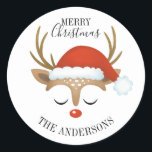 Merry Christmas Cute Reindeer Classic Round Sticker<br><div class="desc">A cute reindeer face with a santa hat decorates this sticker with the words Merry Christmas. Fun for decorating Christmas gifts and holiday treat bags for neighbours. Personalise it with your name. Designed for you by Blackberry Boulevard.</div>