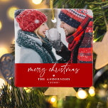 Merry Christmas Family/Couple's Names 2-Photo Ceramic Ornament<br><div class="desc">Spread Christmas cheer with this charming personalised photo ornament featuring a red and white design. The front showcases a photo with the greeting "Merry Christmas" in elegant handwritten script, along with your family or couple's names and the year, all set against a vibrant red background. The back displays another photo....</div>