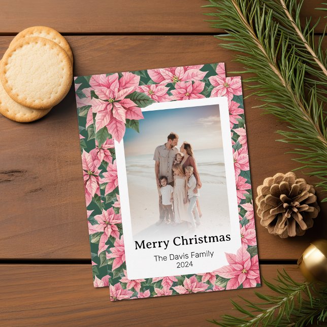 Merry Christmas Family Photo Pink Poinsettia Holiday Card (A pink poinsettia Christmas card customizable with your family photograph and name)