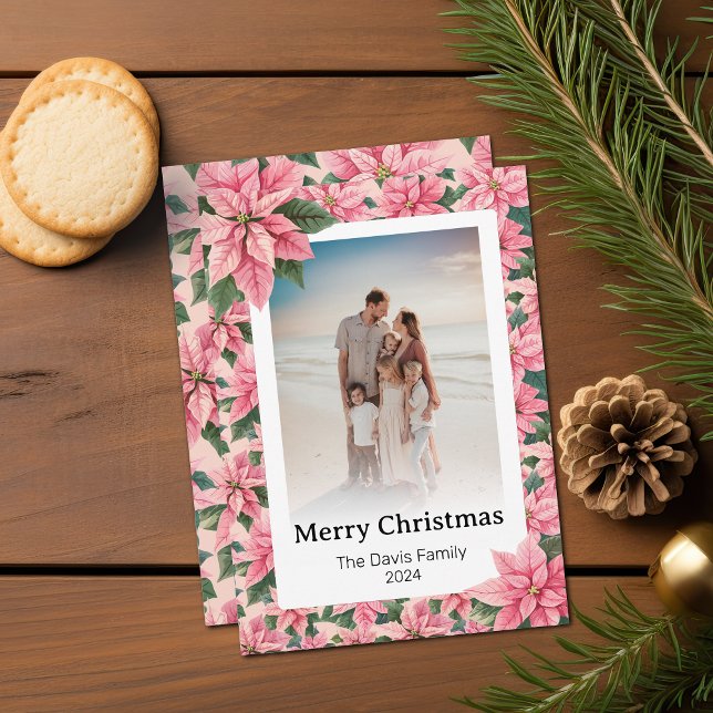 Merry Christmas Family Photo Pink Poinsettia Holiday Card (A pink poinsettia Christmas card customizable with your family photograph and name)