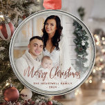 Merry Christmas Family Photo Rose Gold Script Metal Ornament<br><div class="desc">Spread holiday cheer to friends and family with this modern keepsake ornament. The rose gold faux foil text reads "Merry Christmas" in elegant handwriting script. Replace the sample image with your favourite photo,  and add your family name and the year. A white gradient filter helps make the text pop.</div>