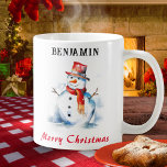 Merry Christmas Festive Personalised Snowman Coffee Mug<br><div class="desc">Relax and enjoy your favourite hot drinks in your own personalised Christmas mug. The festive mug features a watercolor-style picture of a cheerful snowman, with 'Merry Christmas' greeting in red script typography. Full of winter charm, the snowman mug makes a fun holiday gift, as a stocking stuffer, secret Santa gift,...</div>