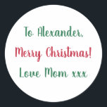 Merry Christmas from Mum Red and Green Classic Round Sticker<br><div class="desc">This is a Christmas gift tag label in festive red and green. It has the message Merry Christmas Love Mum xxx in stylish typography script. To personalise, simply change the name Alexander to your loved one's name in the personalise this text box. Want to make more changes? All of the...</div>