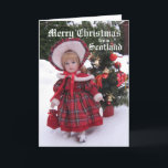 Merry Christmas from Scotland                  ... Holiday Card<br><div class="desc">Scottish doll in amidst snow background with Merry christmas text</div>