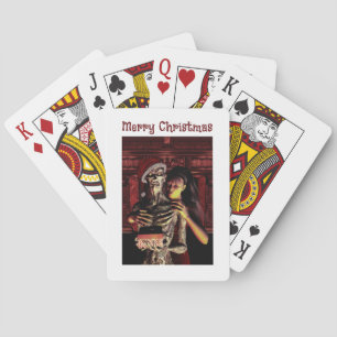 Merry Christmas. Funny skeleton with woman Playing Cards