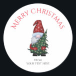Merry Christmas Gnome With Glitter Christmas Tree Classic Round Sticker<br><div class="desc">Add a festive touch to your gifts and crafts with our Merry Christmas Gnome with Glitter Christmas Tree classic round sticker! This customised label features the cutest gnome, paired with a sparkling Christmas tree design, perfect for adding some holiday cheer to any project. The high-quality sticker material guarantees long-lasting adhesion,...</div>