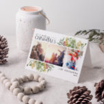 Merry Christmas Gold Winter Botanical Photo Holida Holiday Card<br><div class="desc">Looking for a unique holiday card that will really stand out? Check out our Merry Christmas Gold Winter Greenery Botanical Photo Holiday Card! This beautiful card features three of your favourite photos, surrounded by festive red and green winter motifs. Modern calligraphy completes the look, making this one holiday card that...</div>