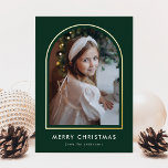 Merry Christmas Green Arch Photo Foil Holiday Card<br><div class="desc">Modern holiday photo card featuring your vertical photo nestled inside of a dark green arch frame with a gold foil border. Personalize the gold foil holiday card with your custom greeting and family name in white lettering. The card reverses to a simple white snow pattern.</div>