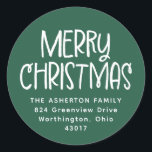 Merry Christmas green white holiday return address Classic Round Sticker<br><div class="desc">Cute and festive, this holiday return address sticker is the perfect finishing touch for your Christmas cards. Designed to coordinate with the Lea Delaveris Design Fa La La and Ho Ho Ho collection, this simple return address sticker features a green background with a white Merry Christmas along with your personalised...</div>
