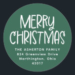 Merry Christmas green white holiday return address Classic Round Sticker<br><div class="desc">Cute and festive, this holiday return address sticker is the perfect finishing touch for your Christmas cards. Designed to coordinate with the Lea Delaveris Design Fa La La and Ho Ho Ho collection, this simple return address sticker features a green background with a white Merry Christmas along with your personalised...</div>