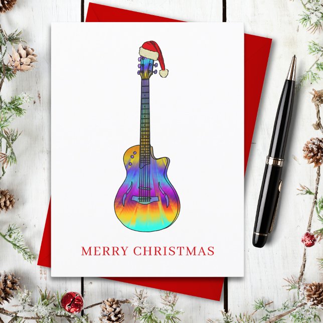 Merry Christmas Guitar Colourful  Holiday Postcard (Christmas guitar wearing a santa hat holiday greetings postcard )