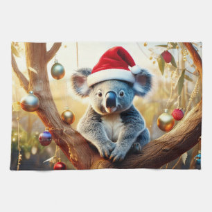 Merry Christmas Koala sitting in Gumtree Tea Towel