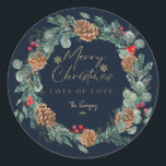 Merry Christmas Navy Watercolor Greenery Script Classic Round Sticker<br><div class="desc">Merry Christmas holiday sticker design that features a beautiful Christmas foliage watercolor wreath design with eucalyptus greenery,  leaves,  pinecones and red berries. Faux gold foil Merry Christmas with little snowflakes space for a personalized message from you. A beautiful traditional Christmas present sticker to make your gift wrapping extra special.</div>