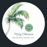 Merry Christmas Palm Tree Coastal Business Logo Classic Round Sticker<br><div class="desc">A modern stylish holiday flat greeting card with modern and handwritten script typography featuring a decorated Palm Tree. Easily customise this card by clicking the "Personalise" button. Whether you're expressing gratitude, extending best wishes, or simply sharing the spirit of the season, our Custom Palm Tree Business Christmas Greetings Card is...</div>