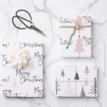 Merry Christmas Pine Trees Wrapping Paper Sheet<br><div class="desc">Beautiful and elegant black and white Merry Christmas wrapping paper with a bit of pink is perfect for those who like a simple and minimalist aesthetic and a tiny pop of colour. The pine Christmas trees have a tiny gold star. So pretty with the hand written script typography. See coordinating...</div>
