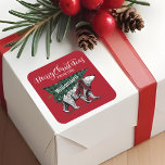 Merry Christmas Polar Bear Tree Delivery Family Square Sticker<br><div class="desc">Celebrate the magical and festive holiday season with our custom holiday stickers. The design features "Merry Christmas" displayed in a white script typography along with our hand-drawn vintage etched style polar bear illustration with the polar bear delivering a fresh cut plaid green Christmas tree on it's back. The polar bear...</div>
