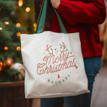 Merry Christmas Red Green Personalised Reindeer Tote Bag<br><div class="desc">Embrace the joy of the season with this personalizable Merry Christmas tote bag! This delightful gift for family and friends comes with the option to add a custom name, making it an extra special gesture. The tote bag features an elegant script that spells out "Merry Christmas, " adorned with sparkling...</div>