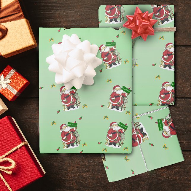 Merry Christmas Santa Animals Tree Bows Green Wrapping Paper Sheet (Santa Claus With little animals Birds decorated tree holly leaves on green wrapping paper sheets.)
