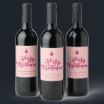 Merry Christmas Script Pink Holiday Wine Wine Label<br><div class="desc">Hand lettered "Merry Christmas" script,  bottle labels. Design features,  Christmas tree icon accent and two template text lines in chic pink peacock on blush colour background.</div>