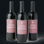 Merry Christmas Script Rose Pink Holiday Wine Label<br><div class="desc">Hand lettered "Merry Christmas" script,  bottle labels. Design features,  Christmas tree icon accent and two template text lines in chic pink on dusty rose colour background.</div>