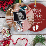 Merry Christmas see you in 2025 photo pregnancy Ceramic Ornament<br><div class="desc">Modern funny see you in 2025 script,  footprints,  and red hearts new baby expecting parents keepsake Merry Christmas from mummy's tummy red tree ornament with your custom ultrasound photo.</div>