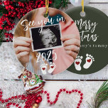 Merry Christmas see you in 2025 photo pregnancy Ceramic Ornament<br><div class="desc">Modern funny see you in 2025 script,  footprints,  and red hearts new baby expecting parents keepsake Merry Christmas from mummy's tummy dark green tree ornament with your custom ultrasound photo.</div>