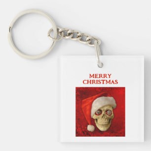 Merry Christmas. Skull wearing Santa hat Key Ring