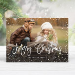 Merry Christmas Snow Photo Holiday Card<br><div class="desc">Celebrate the holidays with this chic Christmas card featuring modern script and snowfall.</div>