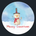 Merry Christmas Snowman Waving And Smiling Classic Round Sticker<br><div class="desc">Stickers with a cute snowman illustration. He is wearing a black stovepipe hat, holding a classic corn cob pipe, and wearing a red scarf. Standing in the cold white snow smiling and waving hello. The background is composed of a watercolor sky with blue and purple colours blending and mingling together....</div>
