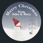 Merry Christmas Snowman With Gold Star Classic Round Sticker<br><div class="desc">Cute snowman in snowflakes with a gold star for an old pine tree in winter woods under the moon.
Greetings and name can be edited.</div>