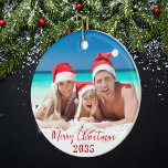 Merry Christmas Sunny Family Photo Ceramic Ornament<br><div class="desc">A double sided christmas tree ornament featuring a photo of your choice on the front and back,  with seasonal red script on both sides. To change or delete the text and photo on either or both sides click on the personalise button.</div>