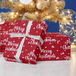 Merry Christmas Text In Snowflakes On Red Wrapping Paper