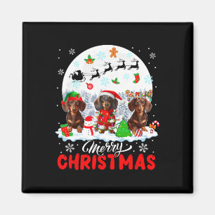 Merry Christmas Three Santa Elf Reindeer Dachshund Magnet