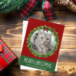 Merry Christmas Wreath Cute Custom Cat Photo Red Postcard<br><div class="desc">Beautiful custom pet Christmas postcard featuring a green holiday wreath with a red background white text. Replace with your cat's photo in the centre of the wreath or add a kitten picture for your friends and family. Merry Christmas is written in white.</div>