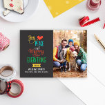 Merry Everything Colourful Typography Photo Holiday Card<br><div class="desc">Simple and stylish Christmas photo card greeting features the phrase "Joy, Love, Peace and Merry Everything" in bold colours and modern type. Colourful snowflakes dress up the back side of the card. Personalise with your photo (portrait format) and with custom text. Charcoal grey / soft black background with golden yellow,...</div>