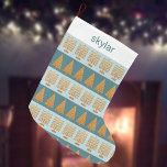 Merry Gold Blue Holiday Stripes Pattern Large Christmas Stocking<br><div class="desc">This personalised faux gold and pastel blue stripes pattern Christmas stocking is a perfect crossover for Chrismukkah and Hanukkah celebrations. Designed with interfaith celebrations and blended families, this custom holiday stocking features alternating stripes of pastel blue with gold Menorahs and deep blue with modern Christmas trees. A white "cuff" portion...</div>